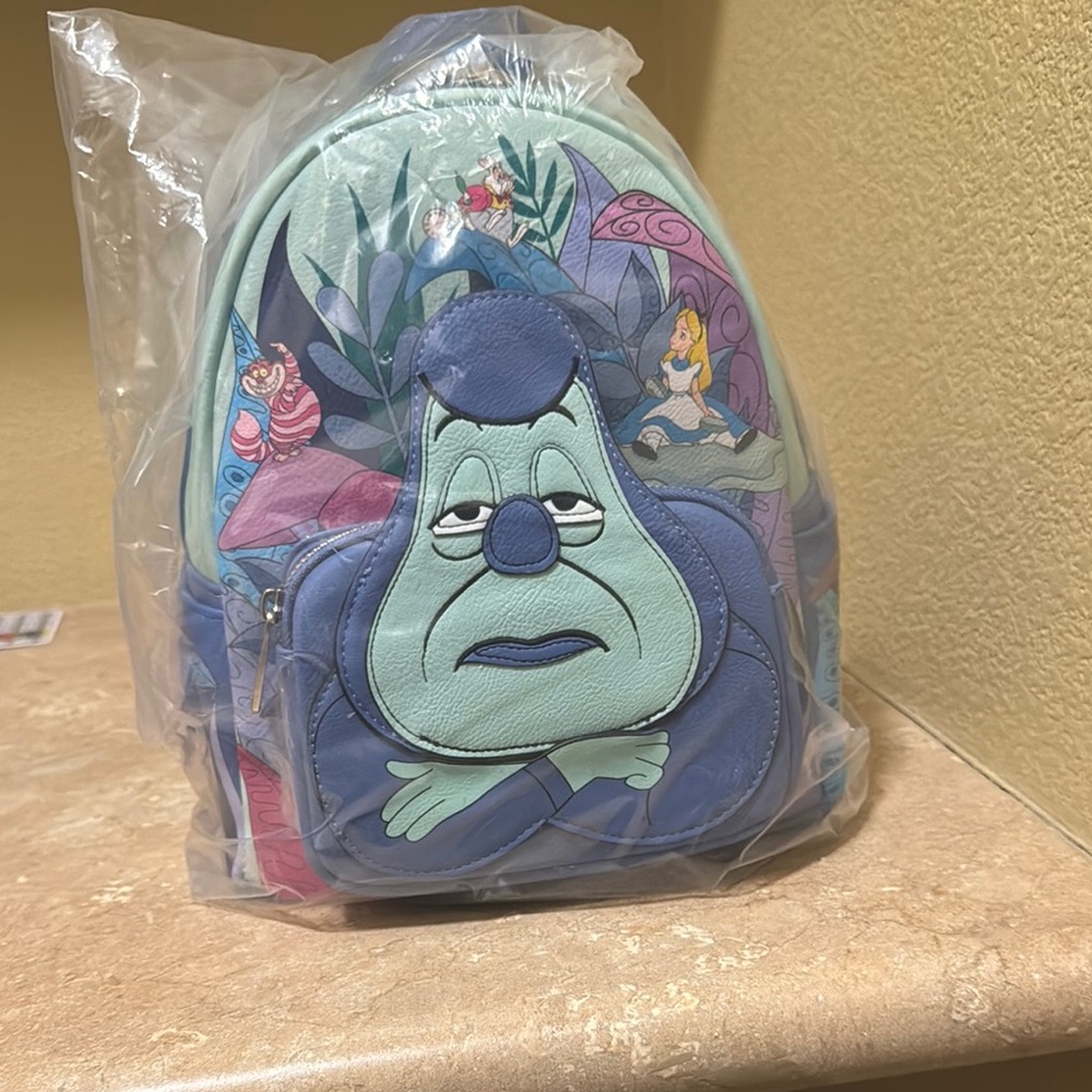 Loungefly Blue and Green Character Backpack